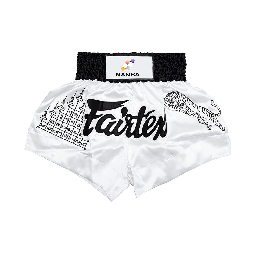 Muay Thai Short NG-2112: white with black script lettering and line-art graphics